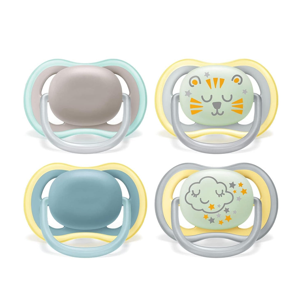 Philips AVENT Set de 4 suzete Ultra Air ușoare și respirabile: 2 suzete care strălucesc în întuneric și 2 suzete pentru zi, 18 luni+ (Model SCF349/43)