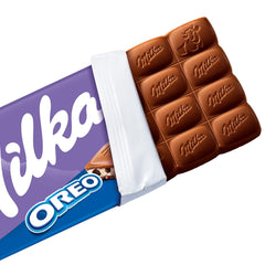 Milka Oreo – Cioccolato al latte alpino ripieno di croccanti pezzi di biscotti Oreo e morbida crema alla vaniglia – 100g