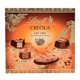 Cioccolata Lindt | Scatola di praline creola | 100 g| 9 praline in 4 deliziosi assortimenti, a base di cacao fine al 100%, senza alcool | Set regalo al cioccolato