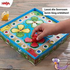 HABA Gioco di Salto - Gioco di dadi per bambini dai 3 anni con ninfee pop-up e varianti di gioco, favorisce il conteggio e la motricità, 2-4 giocatori - 1305272001