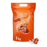 Lindt LINDOR Palline di cioccolato all'arancia rossa | Busta richiudibile da 1 kg | ca. 80 cioccolatini con ripieno scioglievole in bocca | Confezione sfusa, regalo di cioccolato