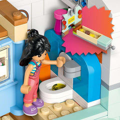 Carovana LEGO Friends, set da costruzione di gioco di ruolo con roulotte giocattolo, regalo per ragazze dai 7 anni in su, set di gioco creativo con 3 minifigure e figura dell'animale furetto 42663 Set da costruzione Besuche den LEGO-Store