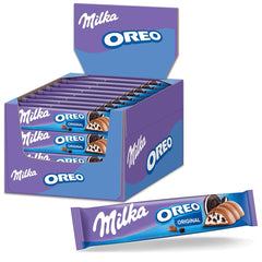 Tavolette di cioccolato Milka – Cioccolato al latte alpino con pezzi di biscotti al cacao e finissimo ripieno di crema al latte – 36 x 37g