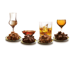 Gocce fini in Brandy Classic Nuts 250g Praline di cioccolato ripiene liquide con glassa al cioccolato al latte e pezzetti croccanti di nocciole