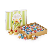 Confezione Varietà di Pasqua Lindt Cioccolato LINDOR | 1,2kg| 2 Cioccolatini al Latte GOLD BUNNY e 8 Varietà LINDOR: Cioccolato al Latte, Noisette, Fondente, Bianco, Nero 60%, Caramello, Caramello Salato, Stracciatella | Cioccolato pasquale | Il coniglietto di Pasqua