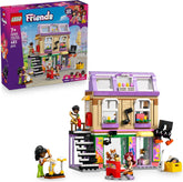 LEGO Friends Musikladen & Wohnung - Spielzeug mit 3 Mini-Puppen, Einer Corgi Tierfigur und Musikinstrumenten wie Klavier, Schlagzeug, Gitarren & Zubehör - Geschenk für Mädchen ab 7 Jahren - 42653
