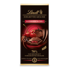 Mousse al cioccolato fondente Lindt con peperoncino e ciliegie | Barretta 150g | Con il 70% di cacao e ripieno di mousse al cioccolato fondente e ciliegia e peperoncino | Tavoletta di cioccolato | Cioccolato fondente