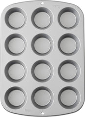 Wilton 03-3118 Stampo per cupcake/muffin, ricetta destra, antihaft, 12 vertiefungen, Grau Stampi e teglie Naty Shop