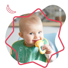 Hrănitoare pentru bebeluși Badabulle cu capac protector, mâner ergonomic, calmează gingiile și introduce arome noi, de la 4 luni, fără BPA