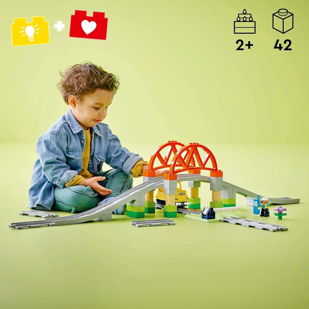 Ponte ferroviario e binari LEGO DUPLO Town - Set di espansione, regalo per bambini dai 2 anni, set di costruzione e ricostruzione, set di sviluppo prescolare, giocattolo educativo 10426 Set di costruzione Besuche den LEGO-Store