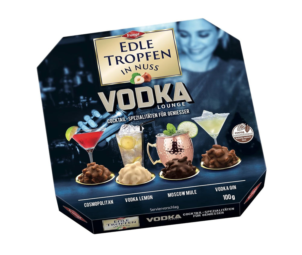 Edle Tropfen in Nuss Vodka Lounge 100g, praline di cioccolato ripiene di liquido con glassa di cioccolato al latte e pezzetti croccanti di nocciola