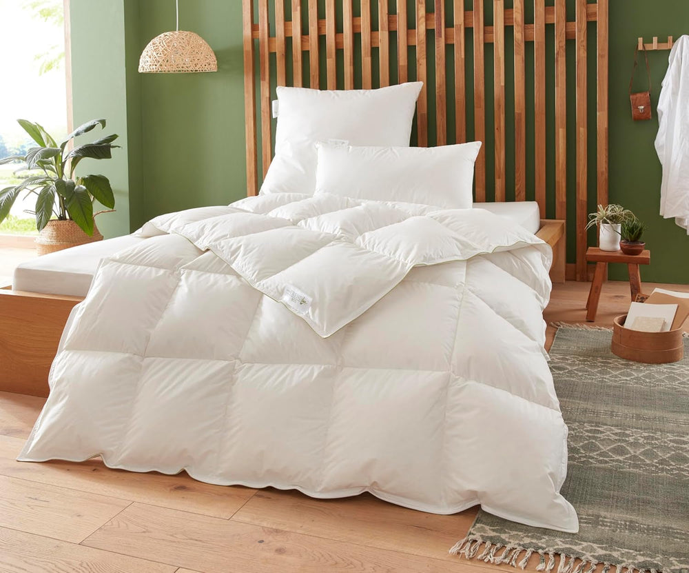 Badenia Trendline Piumino eco caldo con 90% piumino e 10% piume classe I, 135 X 200 cm, bianco, certificato Oeko-Tex, prodotto secondo lo standard di qualità tedesco Piumini e trapunte Naty Shop 135 X 200 Cm Piumino medio per tutte le stagioni