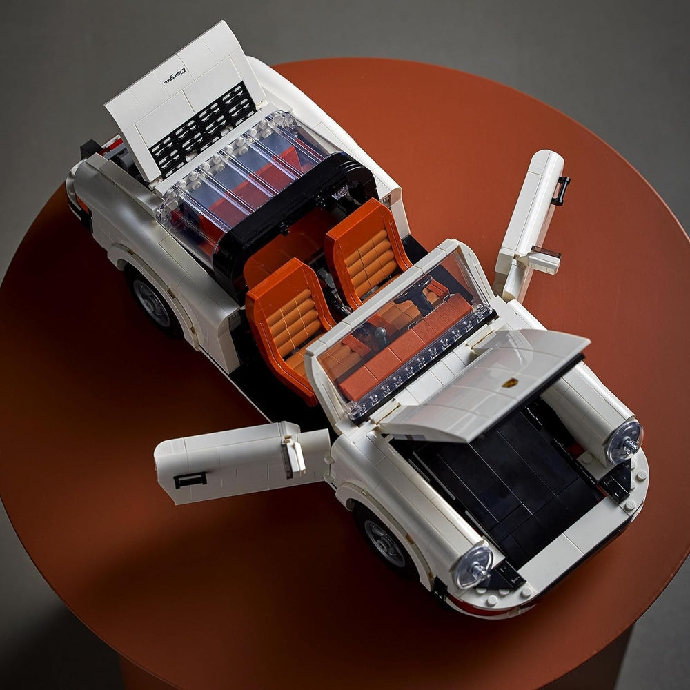 LEGO Icons Modello di auto Porsche 911 per adulti, kit modello di auto da corsa da collezionare 10295 Kit di costruzione Besuche den LEGO-Store