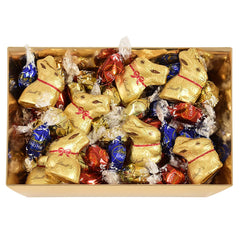 Nido di Pasqua colorato al cioccolato Lindt | 310 g| 8 mini coniglietti dorati, 26 uova di cioccolato al latte Lindor, 15 uova di cioccolato bianco Lindor, 10 uova di cioccolato fondente Lindor | Cioccolato pasquale | Dono di cioccolato
