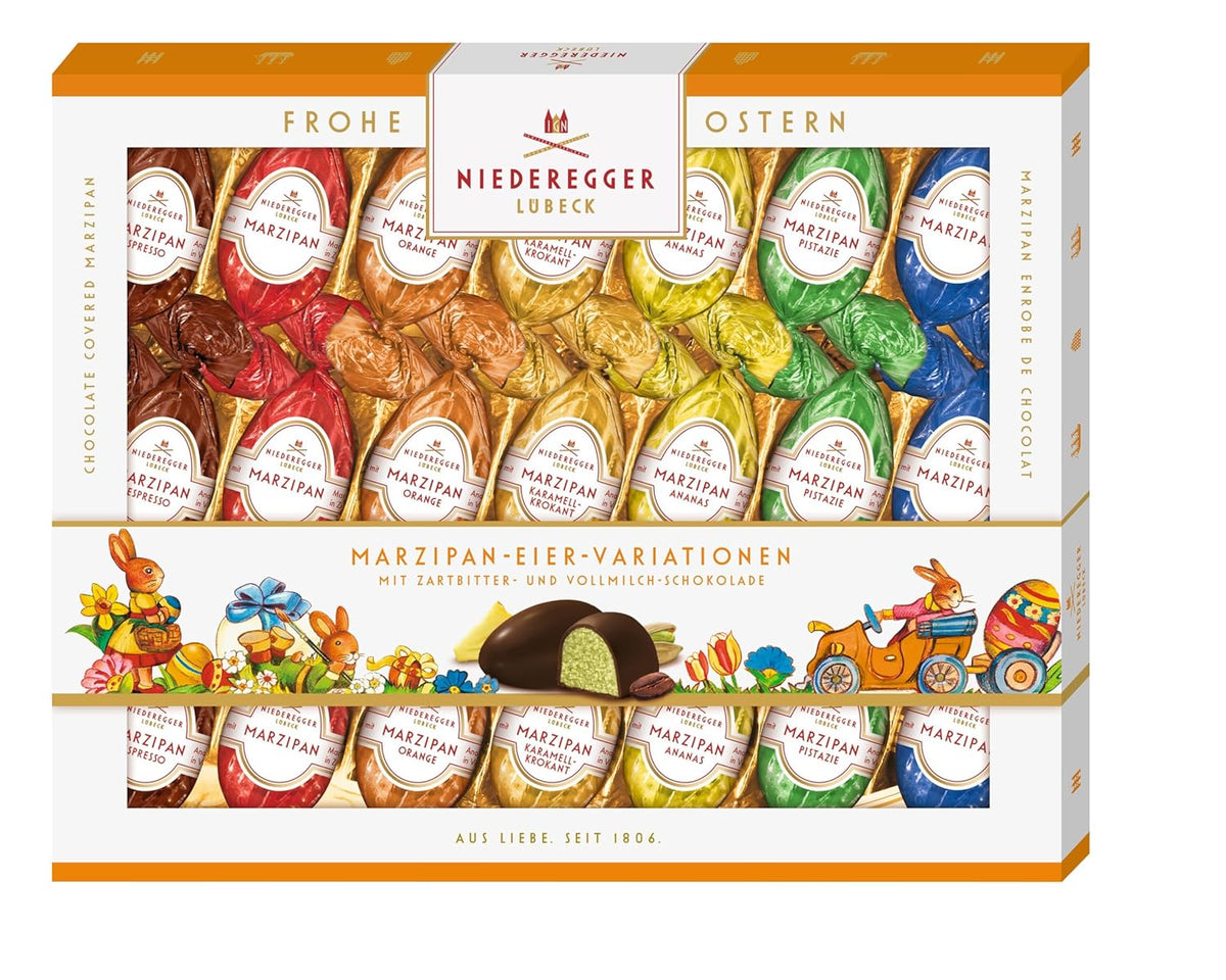 Niederegger | Uova di marzapane | 1x262g | Varianti: Classico, Cioccolato al Latte, Arancia, Caramello Crunch, Ananas, Espresso e Pistacchio | Ricoperto di cioccolato fondente e al latte | Regalo di Pasqua