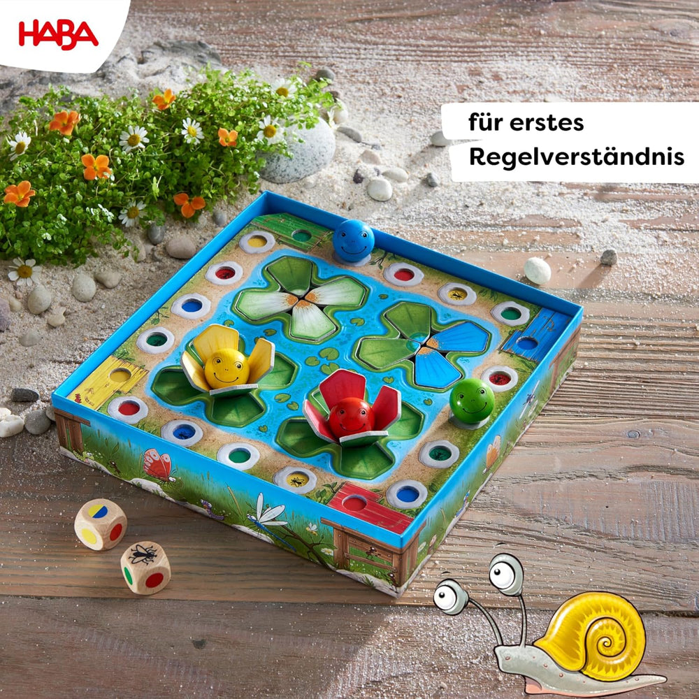 HABA Gioco di Salto - Gioco di dadi per bambini dai 3 anni con ninfee pop-up e varianti di gioco, favorisce il conteggio e la motricità, 2-4 giocatori - 1305272001