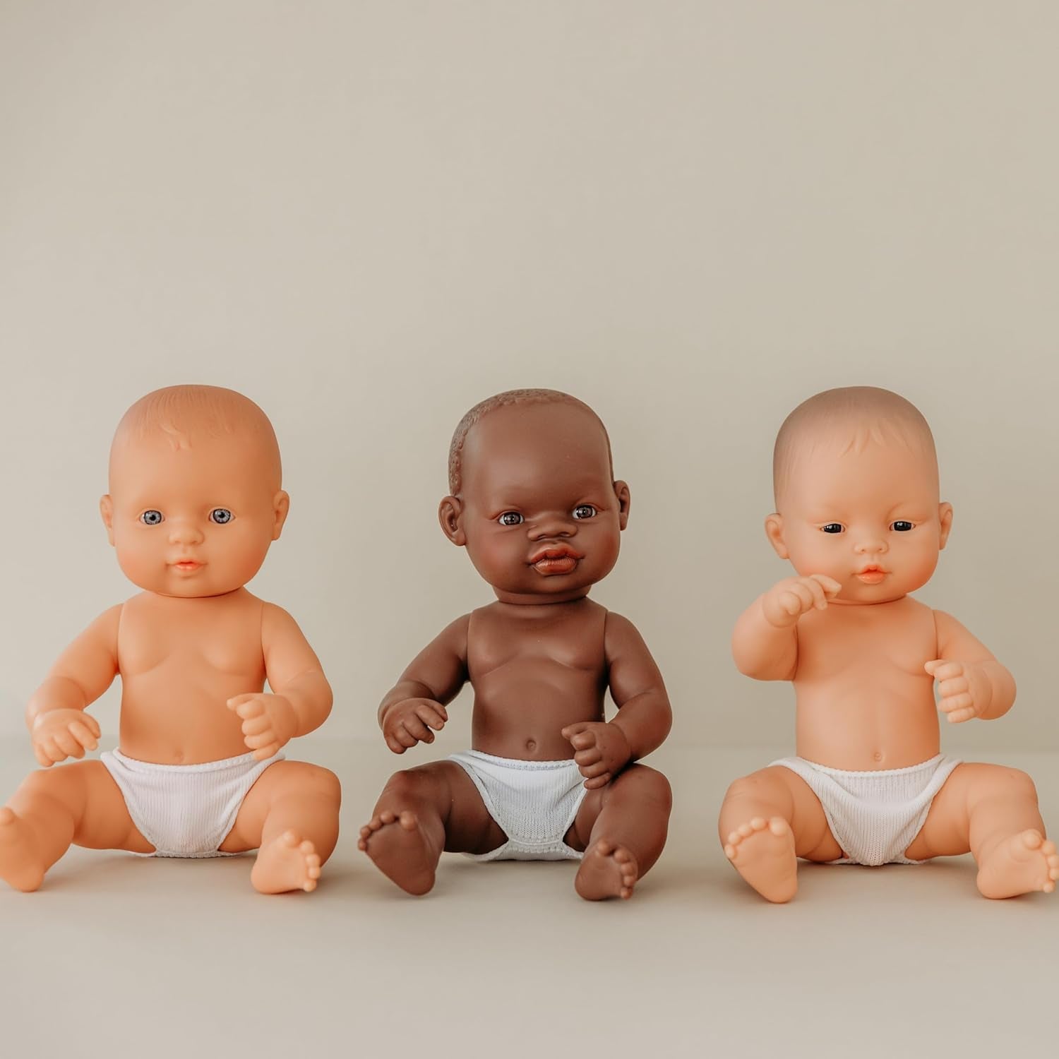 Păpușă Miniland Baby, băiat african, 32 cm, anatomic corect