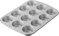 Wilton 03-3118 Stampo per cupcake/muffin, ricetta destra, antihaft, 12 vertiefungen, Grau Stampi e teglie Naty Shop