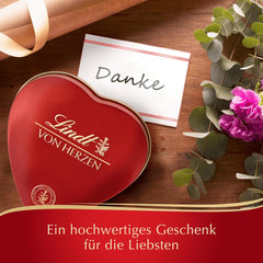 Lindt Cioccolato dal Cuore | 30 g| 6 praline al Marc de Champagne, Coeur à l'Orange, Cioccolato al Latte Croccante, Marzapane all'Arancia in una bellissima scatola a forma di cuore | Regalo di cioccolato | Regalo di cioccolato