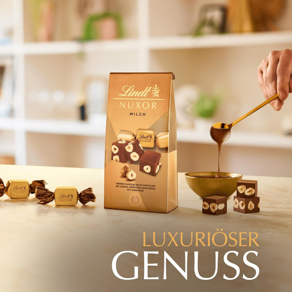 Cioccolata Lindt | Bustina di cioccolato al latte NUXOR | 103g| Cubetti Cremosi Di Cioccolato Al Latte Gianduja Con Nocciole Tostate | Regalo di cioccolato