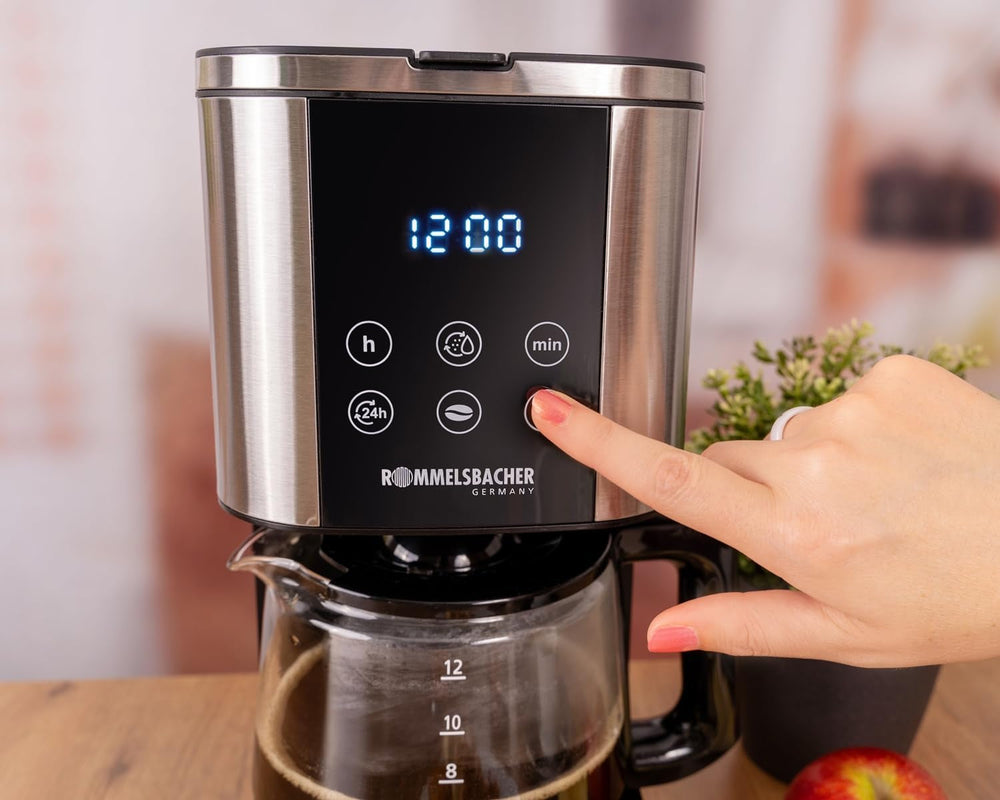 Espressor cu filtru Rommelsbacher FKM 1000 - rezervor de apă de 1,5 litri pentru 12 cești de cafea, carafă de sticlă, pornire cu întârziere, funcție de menținere la cald, funcție de aromă, suport detașabil pentru filtru 1x4