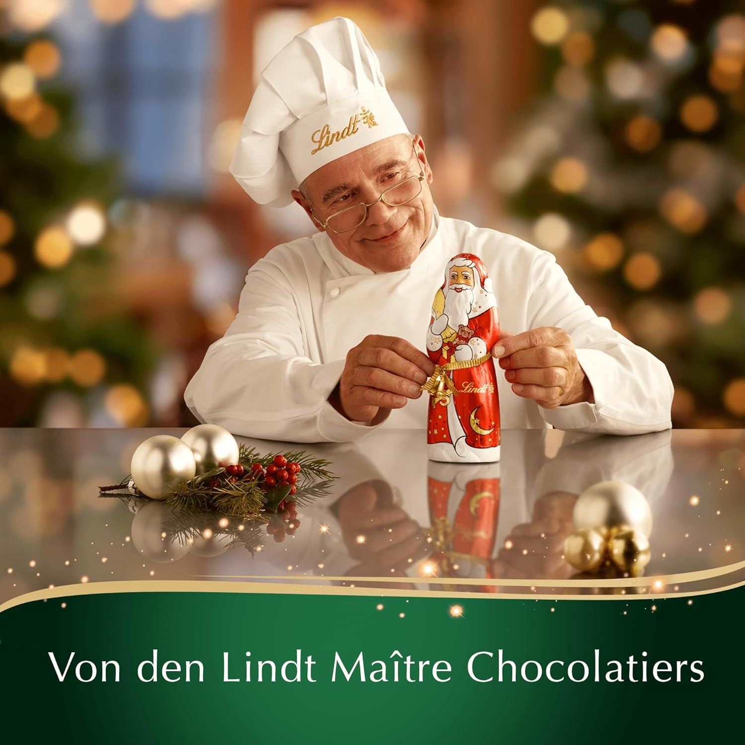 Lindt Tavoletta di cioccolato alle mandorle natalizie | 100 g| Mandorle in crema di noci ricoperte di finissimo cioccolato al latte | Regalo di cioccolato di Natale
