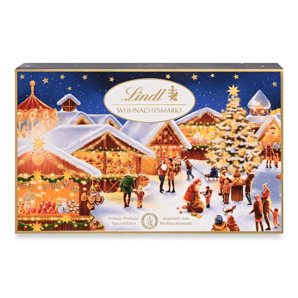 Cioccolata Lindt | Scatola di praline natalizie | Praline natalizie assortite da 200g ricoperte di finissimo cioccolato al latte | Regalo di cioccolato per Natale