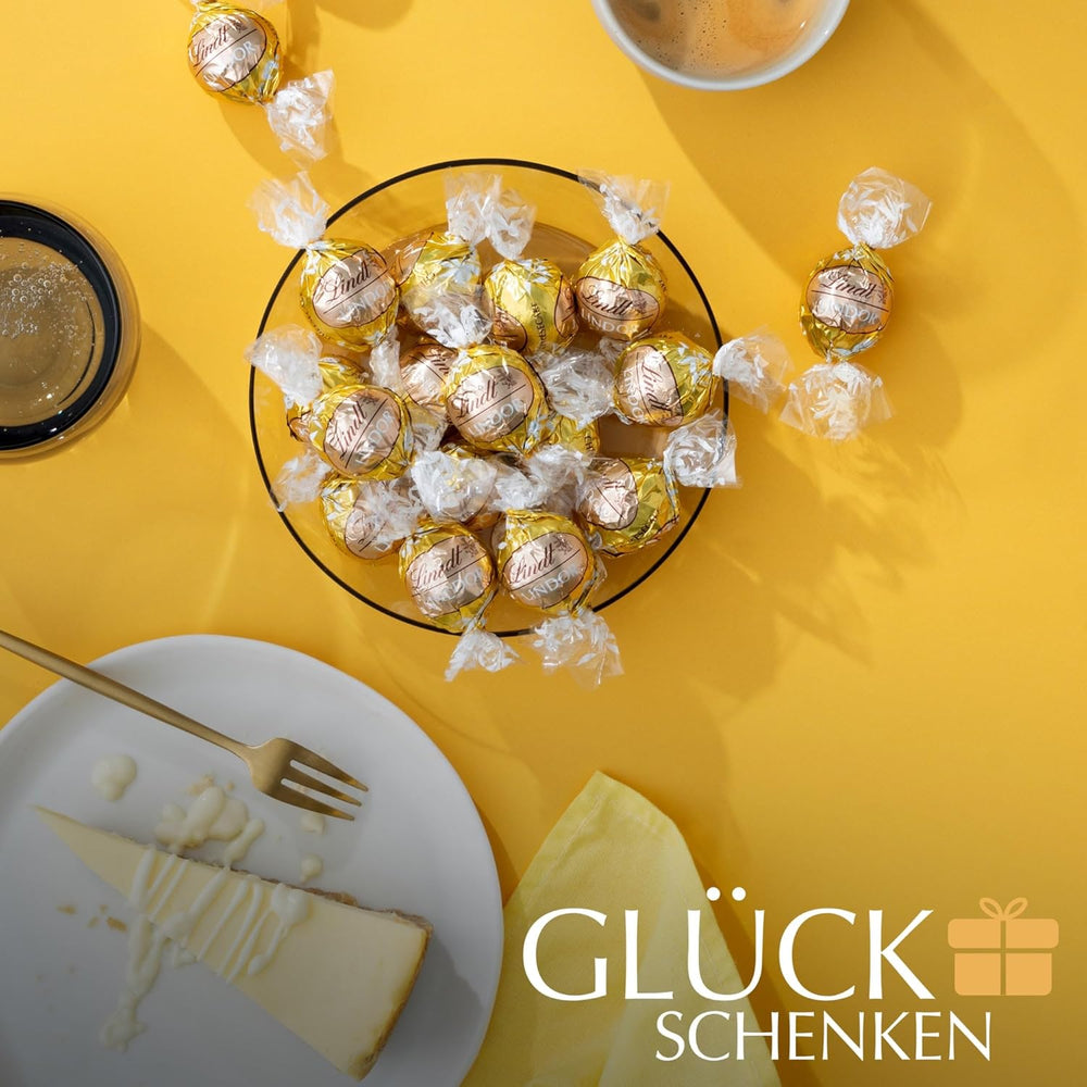 Cioccolata Lindt | Borsa per cheesecake LINDOR | 1kg| 80 palline di cioccolato bianco al latte con ripieno di cheesecake che si scioglie in bocca | Regalo di cioccolato da condividere