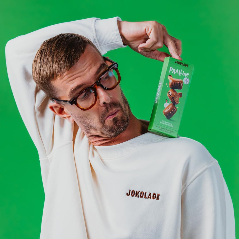 JOKOLADE PRALLINE Confezione Risparmio 12 x 80 g | Ripieno generoso con crema di torrone alla nocciola e chips | Cioccolato giusto di Joko Winterscheidt