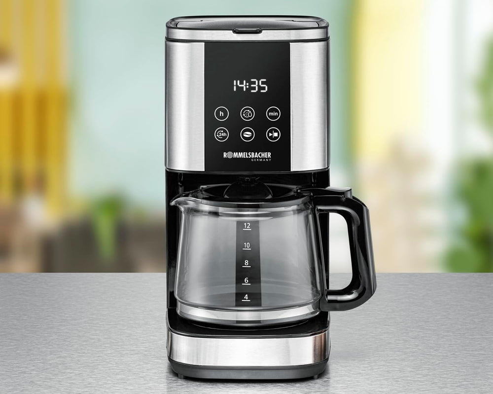Espressor cu filtru Rommelsbacher FKM 1000 - rezervor de apă de 1,5 litri pentru 12 cești de cafea, carafă de sticlă, pornire cu întârziere, funcție de menținere la cald, funcție de aromă, suport detașabil pentru filtru 1x4