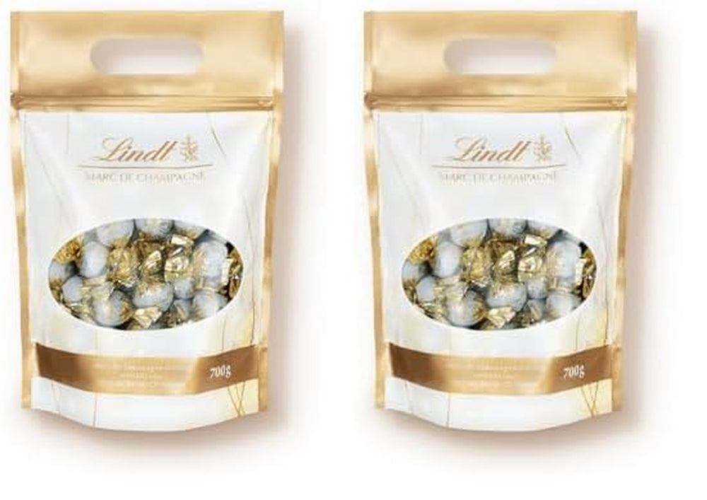Lindt Marc de Champagne Palline di cioccolato | 700 g ca. 56 cioccolatini al latte con ripieno raffinato, contengono alcol | Pacchetto sfuso | Regalo di cioccolato | Regalo di cioccolato