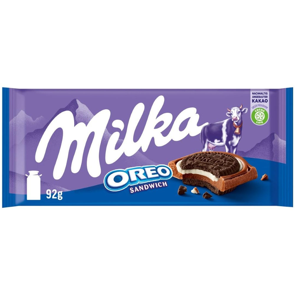 Milka Oreo Sandwich – Cioccolato al latte alpino, ripieno di pezzi croccanti di biscotti Oreo e morbida crema alla vaniglia – 92g