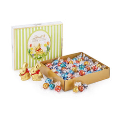 Confezione Varietà di Pasqua Lindt Cioccolato LINDOR | 1,2kg| 2 Cioccolatini al Latte GOLD BUNNY e 8 Varietà LINDOR: Cioccolato al Latte, Noisette, Fondente, Bianco, Nero 60%, Caramello, Caramello Salato, Stracciatella | Cioccolato pasquale | Il coniglietto di Pasqua