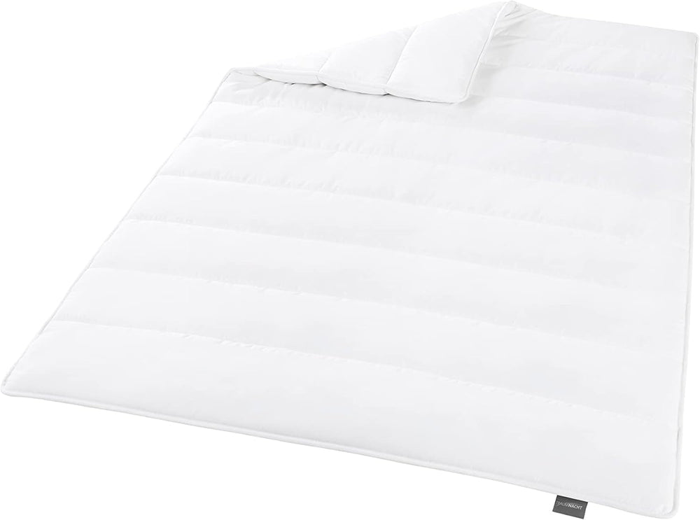 Coperta a risparmio energetico Traumnacht - Coperta invernale extra calda con un peso dell'imbottitura di 1.685 g, 100% microfibra, lavabile a 60 gradi, 135X200 cm, certificata Oeko-Tex, prodotta secondo lo standard di qualità tedesco Copriletti e trapunte Naty Shop