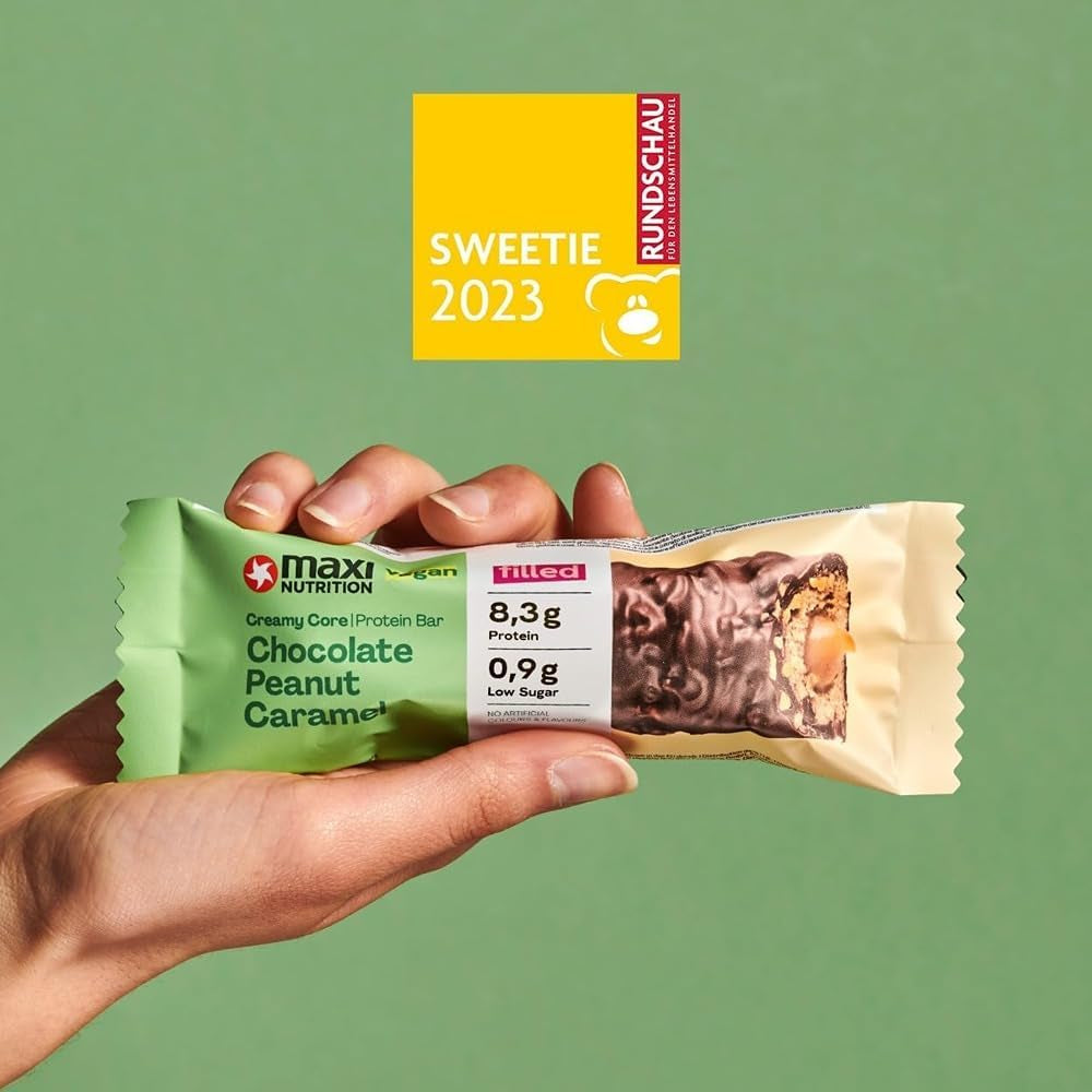 MaxiNutrition Barretta proteica vegana cremosa con cioccolato, arachidi e caramello 12x45g - barretta proteica vegana, 18% di proteine, 8,3 g per barretta, basso contenuto di zucchero (0,9 g), senza zuccheri aggiunti, senza aromi artificiali